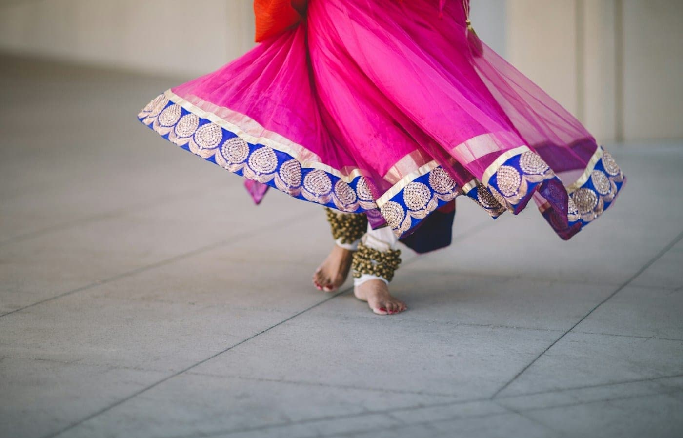 Swirl of a pink skirt with a blue border