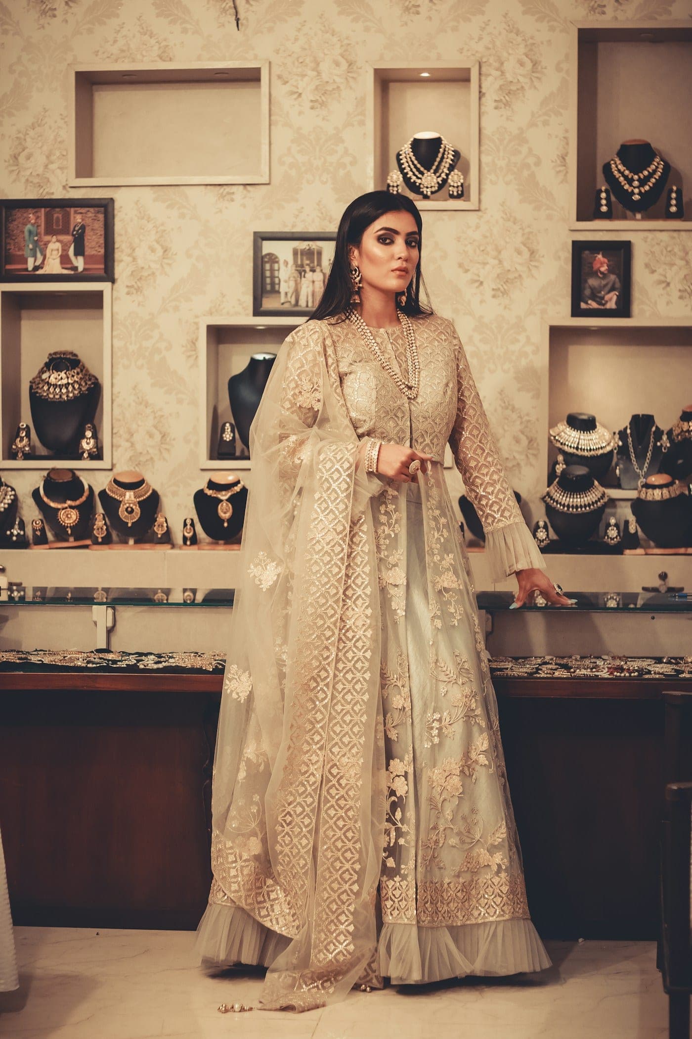 Woman in an ivory embellished anarkali