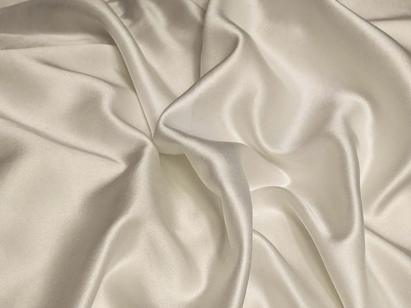 Soft folds of ivory silk